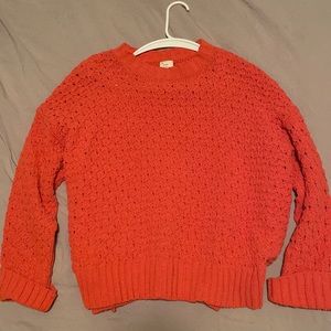 Light weight peachy sweater.